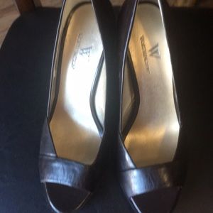 Worth ingrown brown leather heels